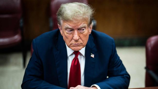 Donald Trump on the first day of his Manhattan Criminal Court trial for allegedly covering up hush money payments linked to extramarital affairs. Picture: AFP