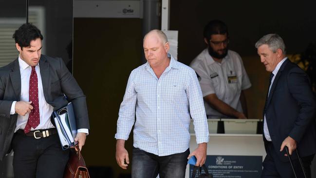 Michael David Sanderson (centre) outside court with solicitor Tom McKee (left) and barrister Nathan Turner (right). Picture: Patrick Woods