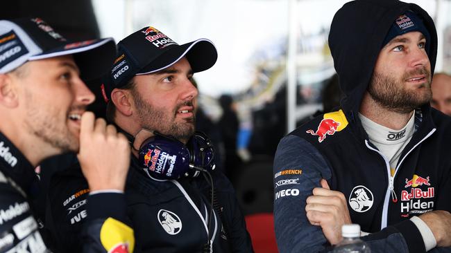 Red Bull Holden Racing Team drivers Earl Bamber (left) and Shane van Gisbergen (right) look on during practice at Bathurst on Friday. Picture: Getty Images