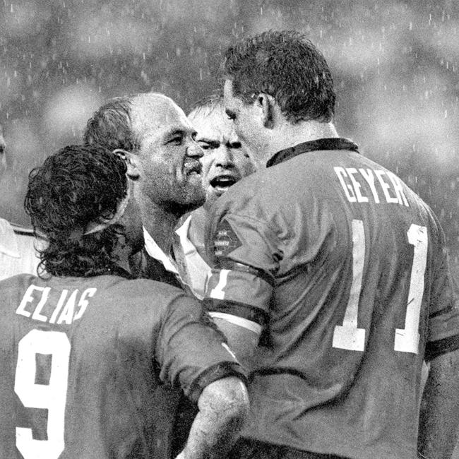 Wally Lewis and Mark Geyer square off.