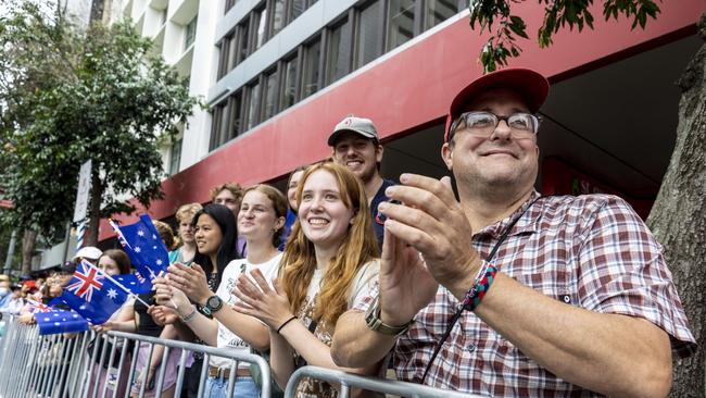 Jay Dumas with his family enjoying the ANZAC Day parade through Brisbane city. Picture: NCA Newswire/Matthew Poon