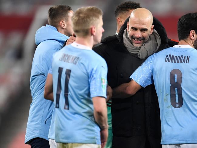 Manchester City's Spanish manager Pep Guardiola reacts at the final whistle during the English League Cup semi final first leg football match between Manchester United and Manchester City at Old Trafford in Manchester, north west England, on January 6, 2021. (Photo by PETER POWELL / POOL / AFP) / RESTRICTED TO EDITORIAL USE. No use with unauthorized audio, video, data, fixture lists, club/league logos or 'live' services. Online in-match use limited to 120 images. An additional 40 images may be used in extra time. No video emulation. Social media in-match use limited to 120 images. An additional 40 images may be used in extra time. No use in betting publications, games or single club/league/player publications. /