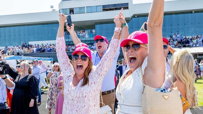 Sasha and Steve Morris and Rachael Kelly celebrate after their horse Skirt the Law wins race 3 at Magic Millions race day. Picture by Luke Marsden.