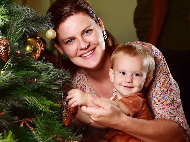 Lisa McGowan with her daughter Eliza, 10 mths, at Geckos Family Centre on Lavarack Barracks celebrating Christmas. Picture: Shae Beplate.