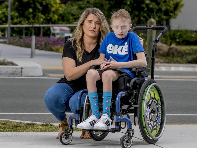 Samuel  Amiet, 11, was left waiting for a taxi for three hours at Coomera Westfield,  after his job was repeatedly rejected. Simone Amiet with her son Samuel Amiet, 11. Picture:  Jerad Williams