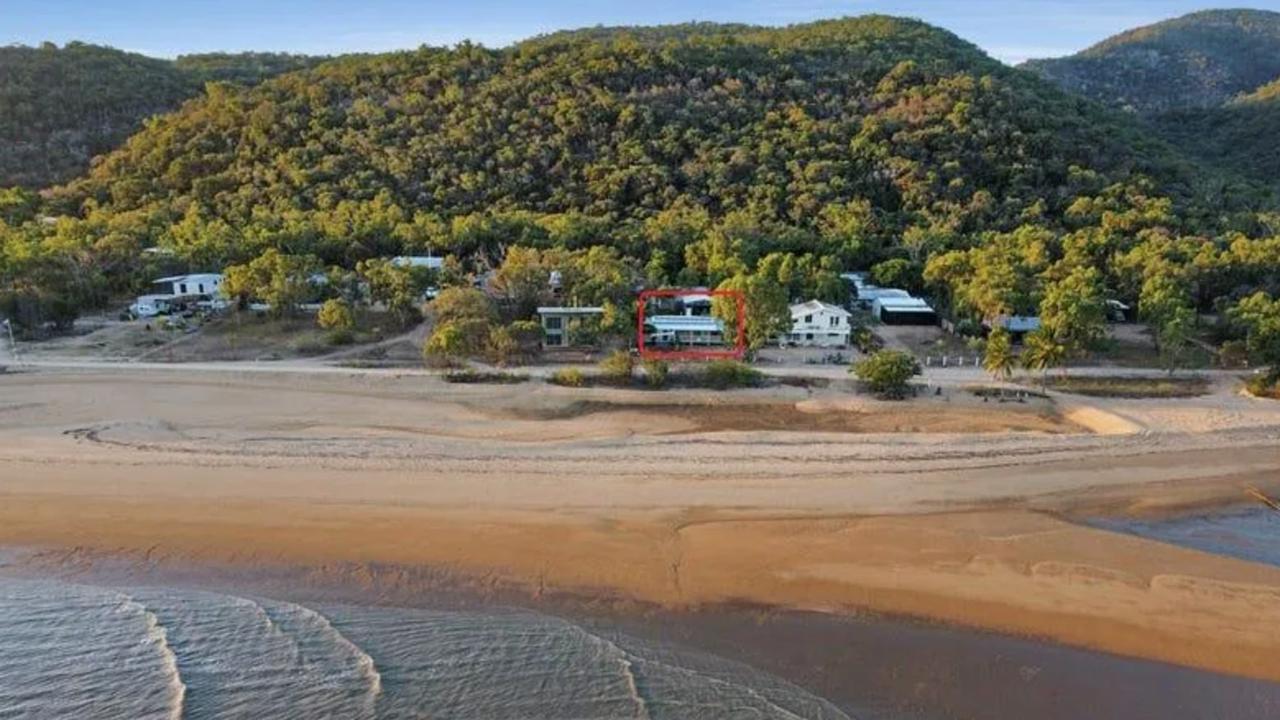 A beachfront home, with water almost lapping at its door and located less than 10km from a major Queensland city has been sold for less than $500,000. Picture: Realestate.com.au