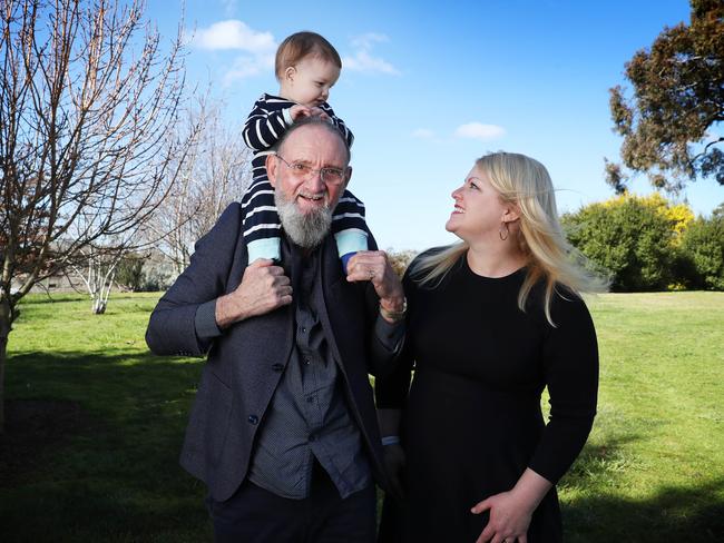 9/8/23: Dr Gregory Smith with partner, Catherine Player, and their baby William, born last year (Gregory is 68) at their home in Orange in country NSW. Gregory Smith  was homeless for 25 years, in and out of jail, and ended up living in the forest behind Byron for a decade. When he finally emerged he sought help, went to TAFE, then to uni and got a PHD in sociology. He's now a senior lecturer at Southern Cross Uni and was  awarded Order of Australia this year. Once the unhappiest man in the world, he has just written a book about happiness. A big part of his new life is his new younger partner, Catherine Player, and their baby William. John Feder/The Australian.