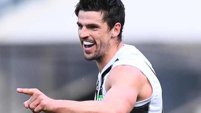 MELBOURNE, AUSTRALIA - AUGUST 10: Scott Pendlebury of the Magpies celebrates kicking a goal during the round 21 AFL match between the Melbourne Demons and the Collingwood Magpies at Melbourne Cricket Ground on August 10, 2019 in Melbourne, Australia. (Photo by Quinn Rooney/Getty Images)