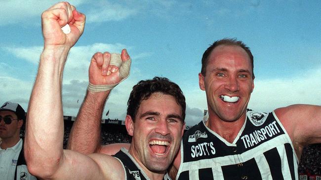 Tim Ginever and Roger Delaney celebrate the 1995 SANFL premiership. Picture: News Corp