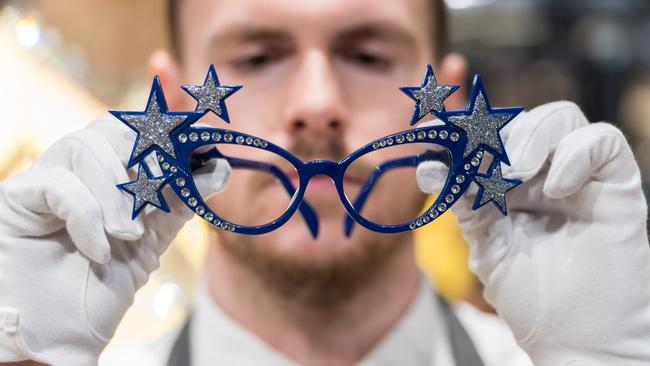 A pair of glittered-star and diamante-encrusted blue-lacquered spectacles by David Cox worth an estimated A$5620. Picture: Wiktor Szymanowicz / Future Publishing /Getty