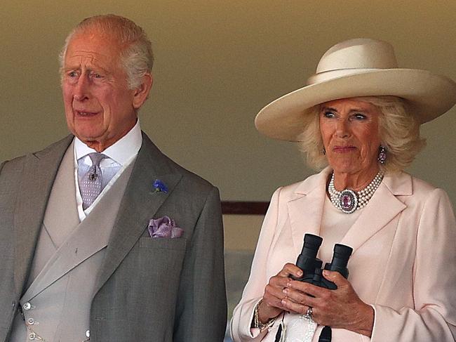 ASCOT, ENGLAND - JUNE 22: King Charles III and Queen Camilla watch from the Royal Box during Day Five of Royal Ascot 2024 at Ascot Racecourse on June 22, 2024 in Ascot, England. (Photo by Andrew Redington/Getty Images)