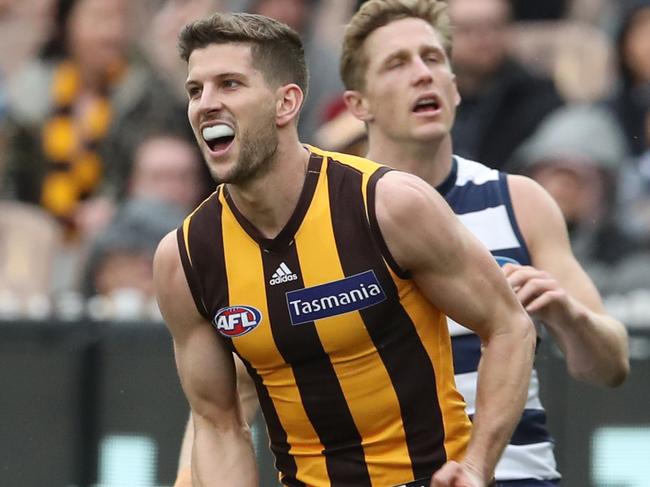 Luke Breust of the Hawks reacts after kicking a goal during the Round 21 AFL match between the Hawthorn Hawks and the Geelong Cats at the MCG in Melbourne, Saturday, August 11, 2018. (AAP Image/David Crosling) NO ARCHIVING, EDITORIAL USE ONLY