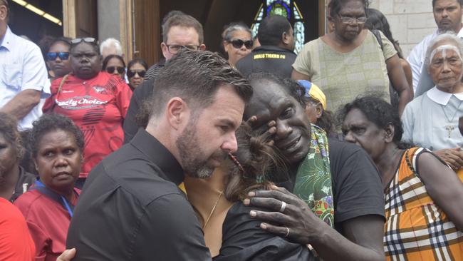 Chansey Paech MLA and Jaunnita Costa grieving the former Arafura MLA Lawrence Costa on Wednesday. Picture: Sierra Haigh