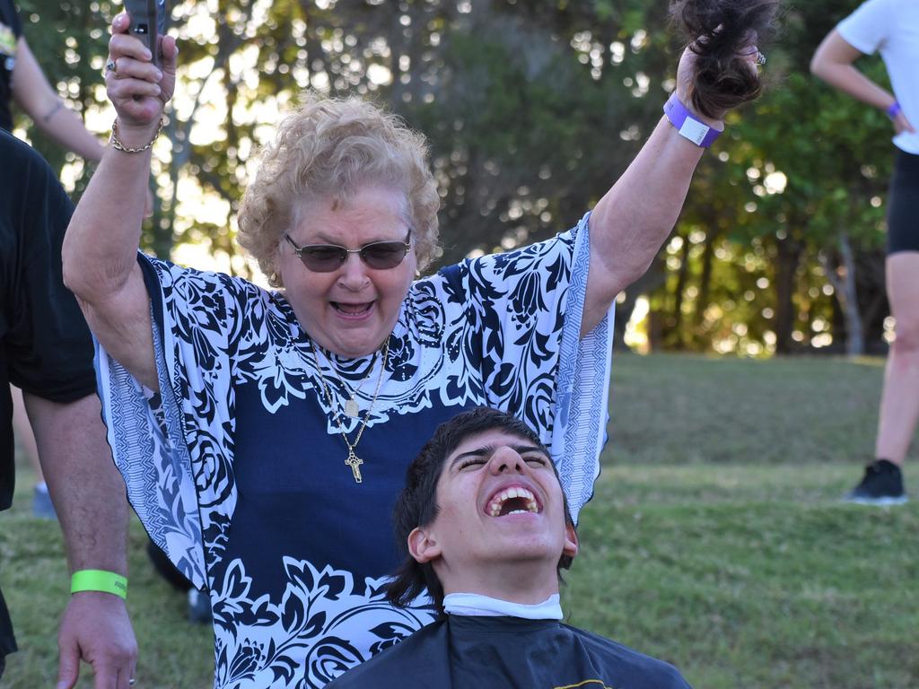 Great-grandmother Mary Vella made the first cut on her great-grandson Dean Grech's mullet at the Mackay Pioneer Valley Relay For Life. Picture: Lillian Watkins