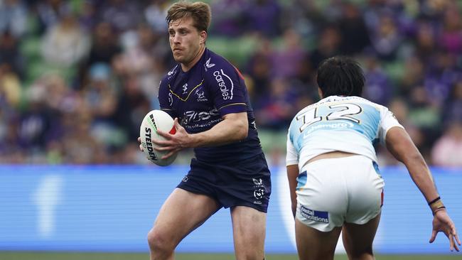 MELBOURNE, AUSTRALIA - AUGUST 26: Cameron Munster of the Storm runs with the ball during the round 26 NRL match between Melbourne Storm and Gold Coast Titans at AAMI Park on August 26, 2023 in Melbourne, Australia. (Photo by Daniel Pockett/Getty Images)