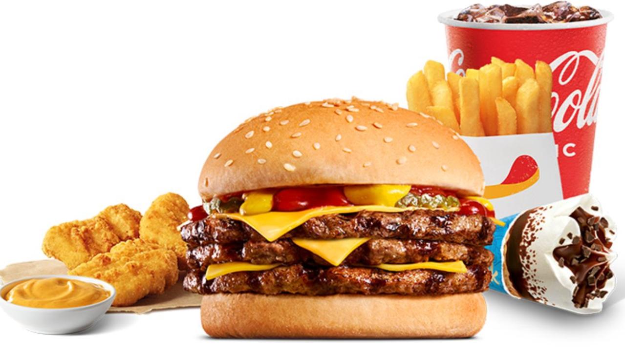 The Triple Cheeseburger Super Stunner is vastly more calories than you could ever need in one sitting. Picture: Hungry Jack's