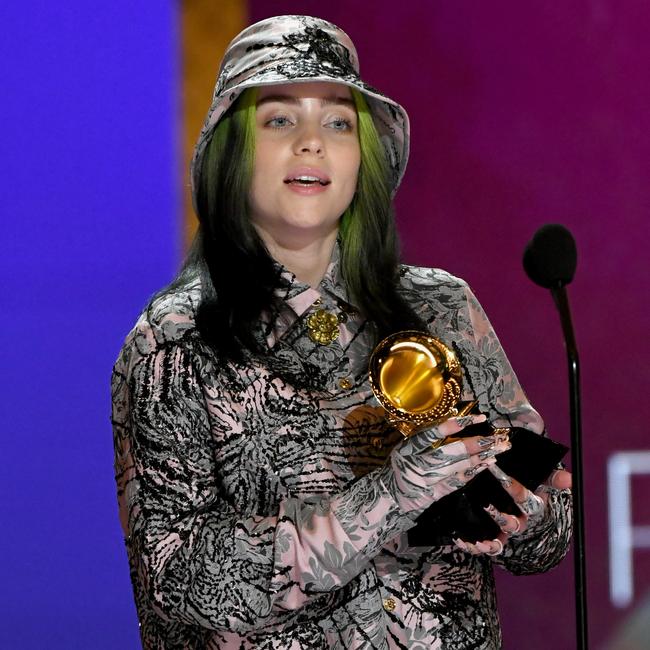 Billie Eilish accepts Record of the Year. Picture: Kevin Winter/Getty