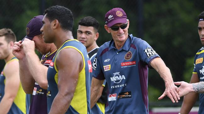 Bennett (C) said he was convinced to stay after chats with the players. Picture: AAP