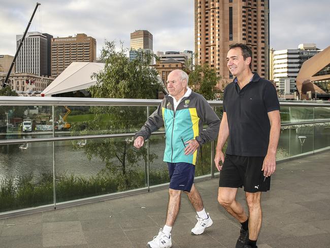 Former PM John Howard and current SA Opposition Leader Steven Marshall walk along the Torrens River at 7.30am Thursday March 1, 2018 - pic AAP/MIKE BURTON