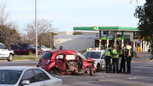 The wreck of Lucy Paveley’s car, on the corner of Kings Rd and Main North Rd, Parafield.  Picture: AAP Image/Dean Martin