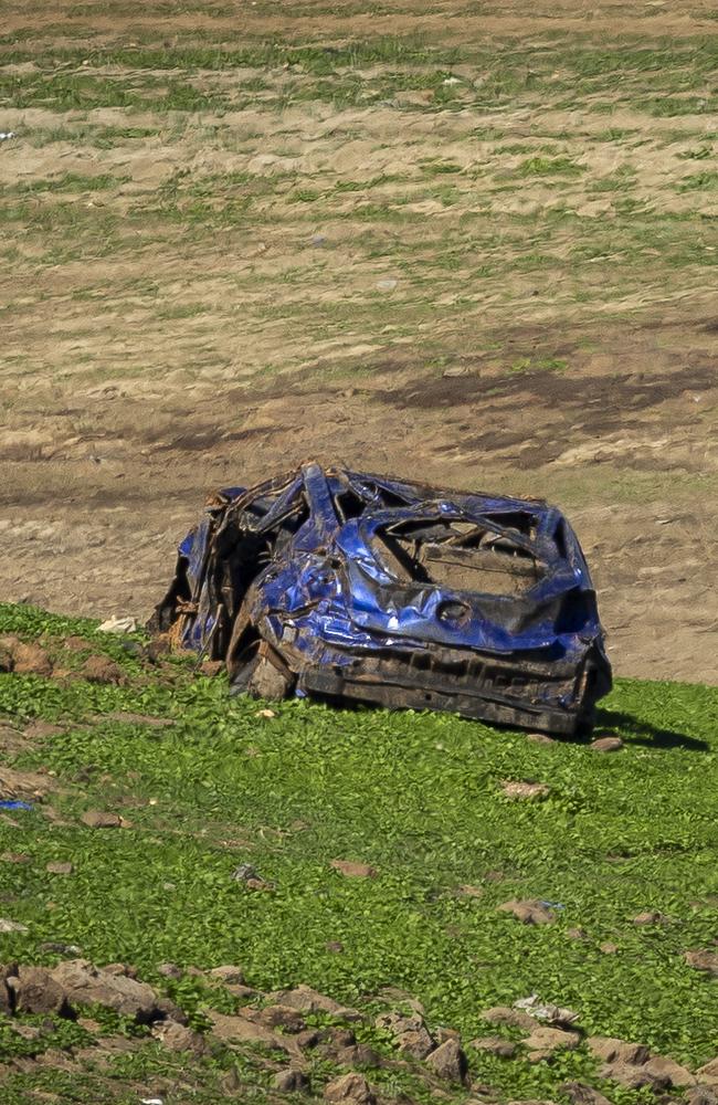 More than a dozen cars were found near the Melton rail bridge alone. Picture: Jake Nowakowski