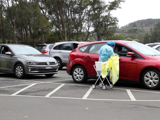 Residents of the northern beaches queue up for Covid-19 tests at a roadside testing centre in Sydney. Picture: AFP