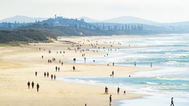 Beachgoers at Coolum during day two of Queensland's Covid-19 lockdown. Picture: Lachie Millard