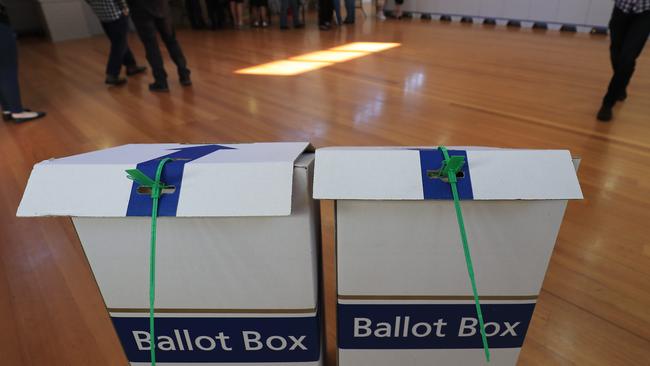 Voters cast their ballots in the Tasmanian State Election at Sorell Memorial Hall, Saturday, March 3, 2018. (AAP Image/Rob Blakers) NO ARCHIVING