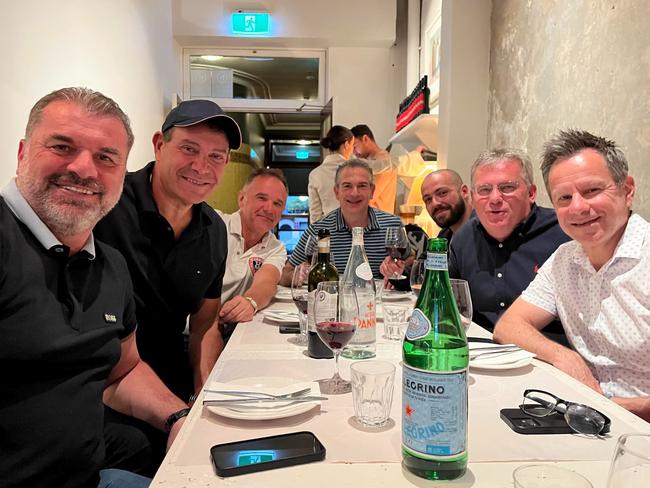 (L-R): Ange Postecoglou, Manny Anezakis, Ralph Battista, Nick Deligiannis, Leon Anezakis, Chris Nikou and John Patsoukas catching up for dinner when Postecoglou was in Sydney with Celtic in 2022. Manny Anezakis and Battista are also headed to Bilbao. Pic Supplied.