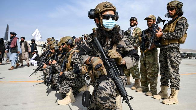 Taliban Badri special force fighters take a position at the airport in Kabul on Tuesday. Picture: AFP