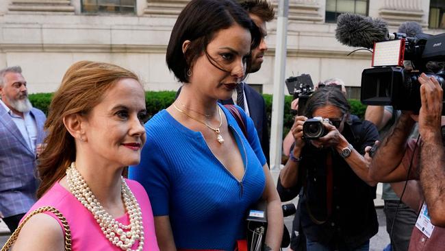 Victims Sarah Ransome (R) and Elizabeth Stein arrive at court for the sentencing hearing of Ghislaine Maxwell. (Photo by TIMOTHY A. CLARY / AFP)