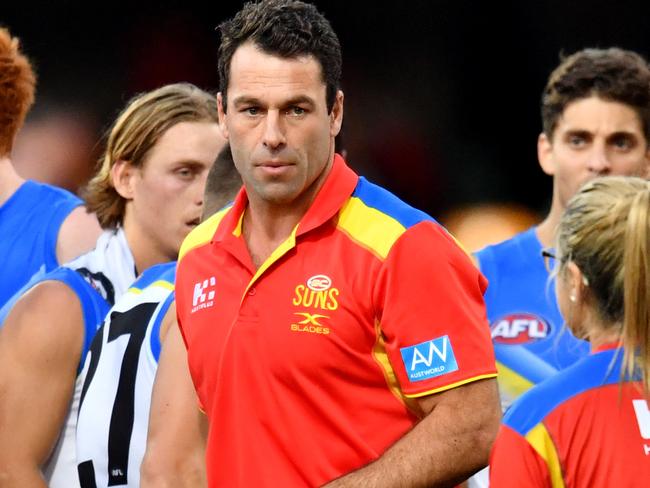 Interim Suns coach Dean Solomon at quarter time during the round 21 AFL match between the Brisbane Lions and the Gold Coast Suns played at the Gabba in Brisbane, Saturday, August 12, 2017. (AAP Image/Darren England) NO ARCHIVING, EDITORIAL USE ONLY