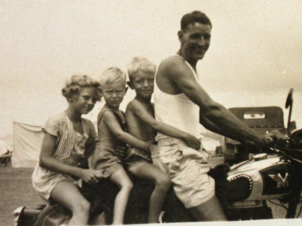 Desche Birtles with her brothers and father Eric Sterry on the back of his motorcycle – she believes her father killed Betty Shanks. Picture: supplied.