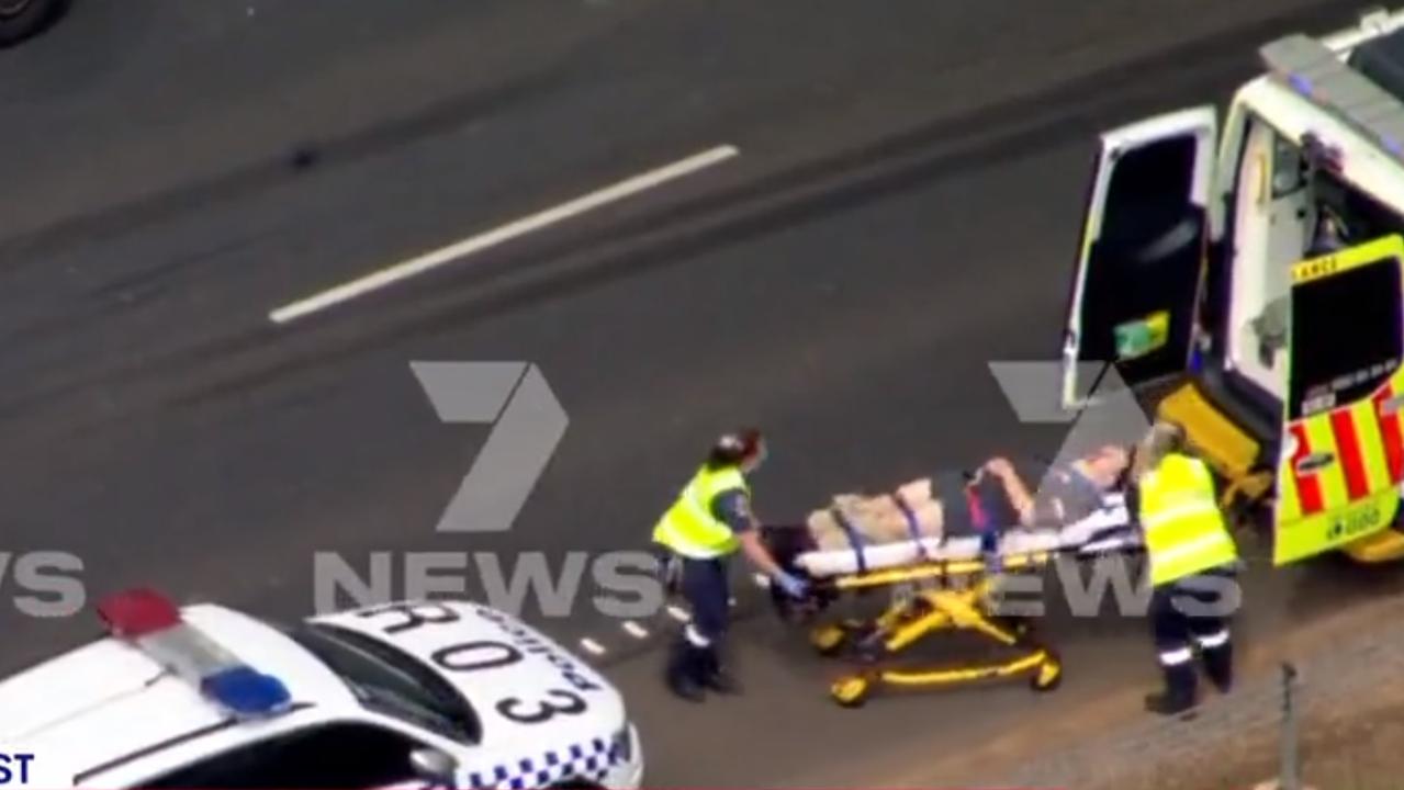 Paramedics take away patients