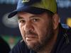 Australia's head coach Michael Cheika takes part in a press conference on September 25, 2015 at Bath University in Bath, two days ahead of their Rugby World Cup 2015 match against Uruguay. AFP PHOTO / MARTIN BUREAU RESTRICTED TO EDITORIAL USE