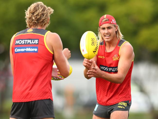 Jeremy Sharp handballs during a Gold Coast Suns AFL training session at Metricon Stadium on May 22, 2020 in Gold Coast, Australia. (Photo by Chris Hyde/Getty Images)