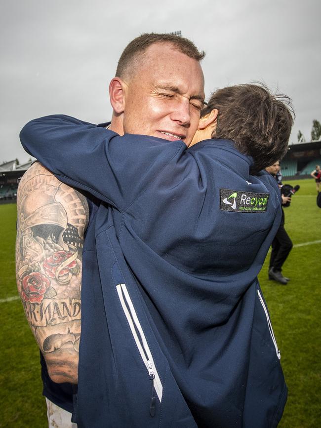 TSL: TSL Grand Final 2020, North Launceston vs. Launceston, UTAS Stadium: Launceston's Mitch Thorp hugs his wife after the siren. Picture: LUKE BOWDEN