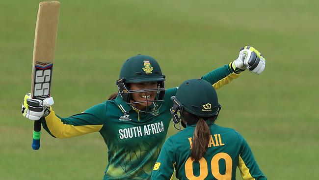 Shabnim Ismail and Sune Luus of South Africa celebrate victory over Pakistan.