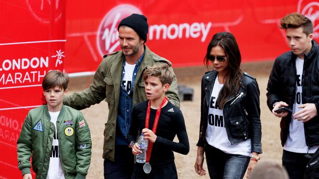 Ahh … the Beckhams. One of the rare famous families where the teenage children don’t seem to mind the company of their own parents. Picture: Steve Bardens/Getty