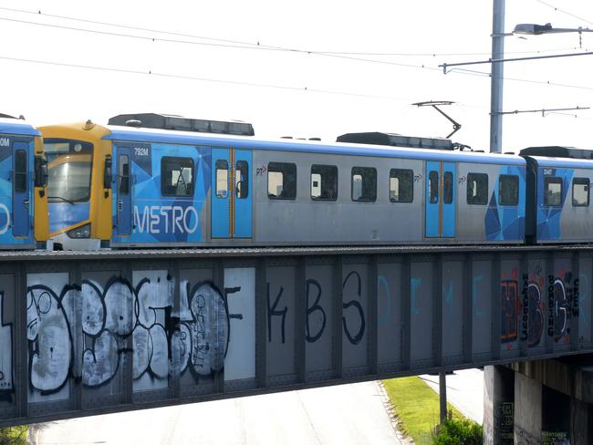 Dunham held the man up against the train window. Picture: Andrew Henshaw