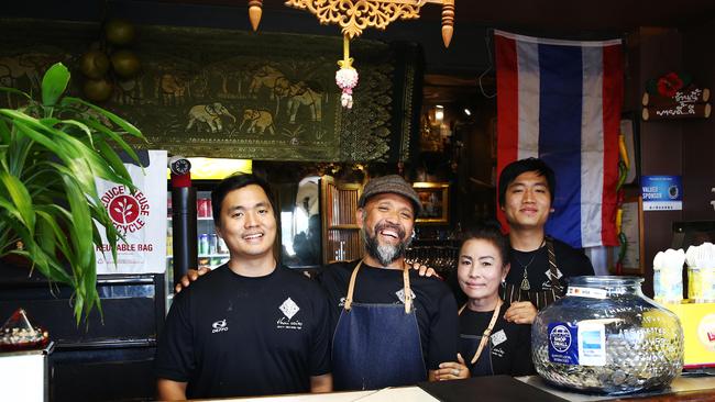 AT HOME: Oak, Joel, Aio and Arf Cruz make diners feel part of the family at Thai Coins restaurant in Mulgrave Rdt. Picture: BRENDAN RADKE