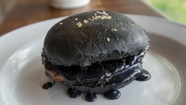 The black beast burger available at The Local Burger Co. Picture: Christopher Chan.