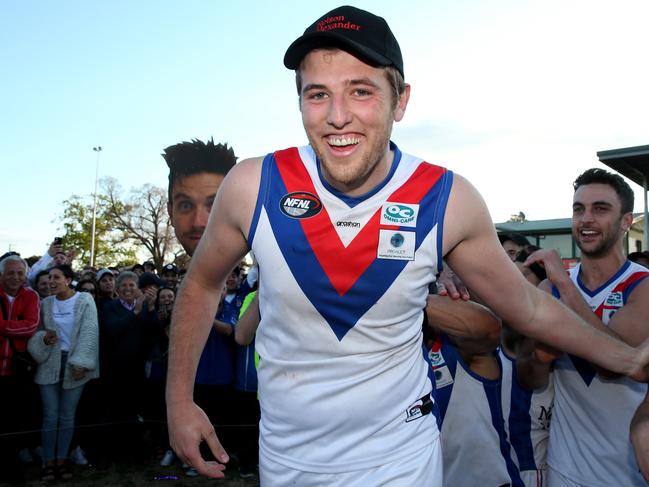 Mark Kovacevic shows off a wide smile after being named best on ground in last year’s grand final. 