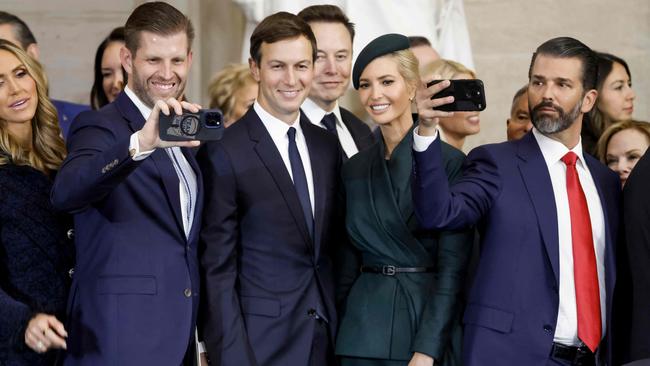 Lara Trump, Eric Trump, Jared Kushner, Ivanka Trump and Donald Trump Jr enjoy the moment as Elin Musk looks on from behind. Picture: AFP