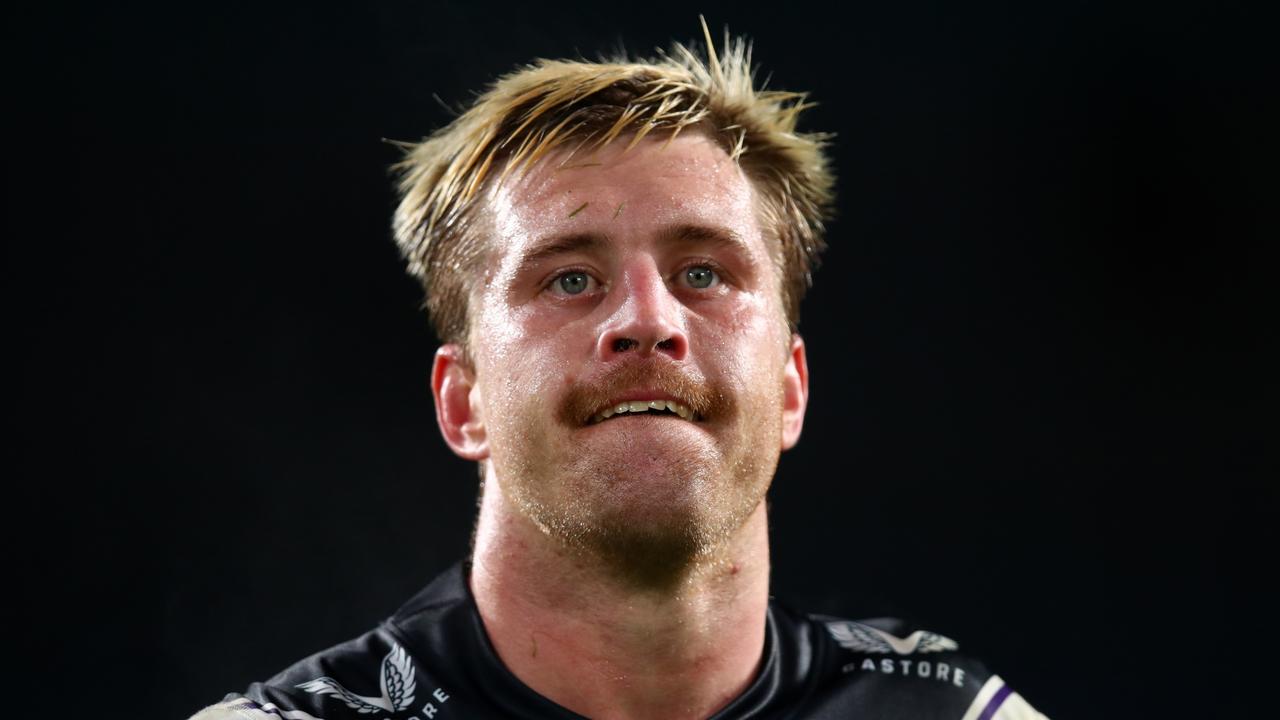 SYDNEY, AUSTRALIA - JULY 23: Cameron Munster of the Storm looks dejected after a loss during the round 19 NRL match between the South Sydney Rabbitohs and the Melbourne Storm at Stadium Australia on July 23, 2022 in Sydney, Australia. (Photo by Jason McCawley/Getty Images)