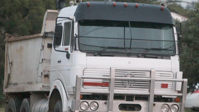 Serial dumper Dib Hanna leaves in his tip truck outside his home in Colyton.