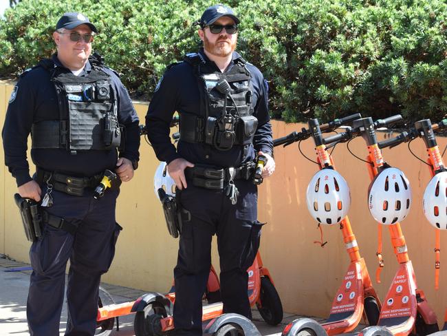 Senior Constable Phil Marshall and Senior Constable Jack Casey speak on e-scooter safety ahead of Townsville's Operation Ride Safe. Picture: Nikita McGuire