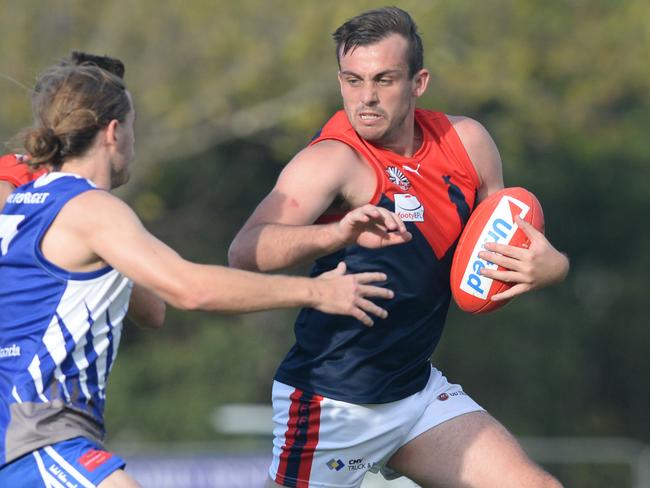 Nick Holloway fends off an opponent. Picture: Chris Eastman/AAP