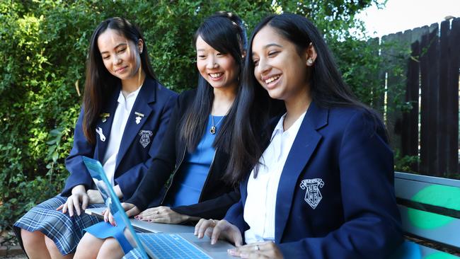 IScope’s Christina Chun, centre, with Elisa Lillicrap, left, and Tanzeem Syeda. Picture: Renee Nowytarger.