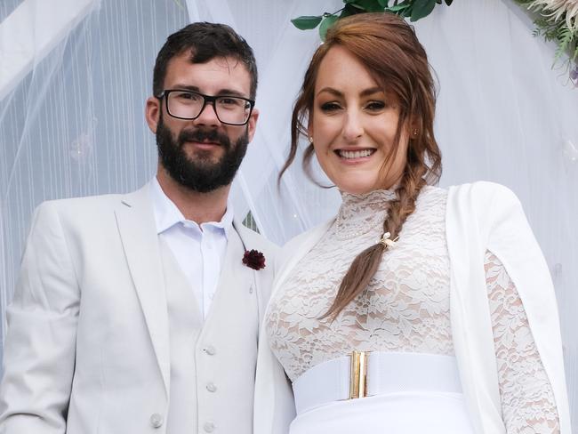 Geelong couple Laura Tasker and Corey Rufus  walked down the aisle today  Sunday after five failed attempts due to COVID-19 - making it the sixth time she  tried to hold her wedding! The dogs name is ArabellaPicture: Mark Wilson